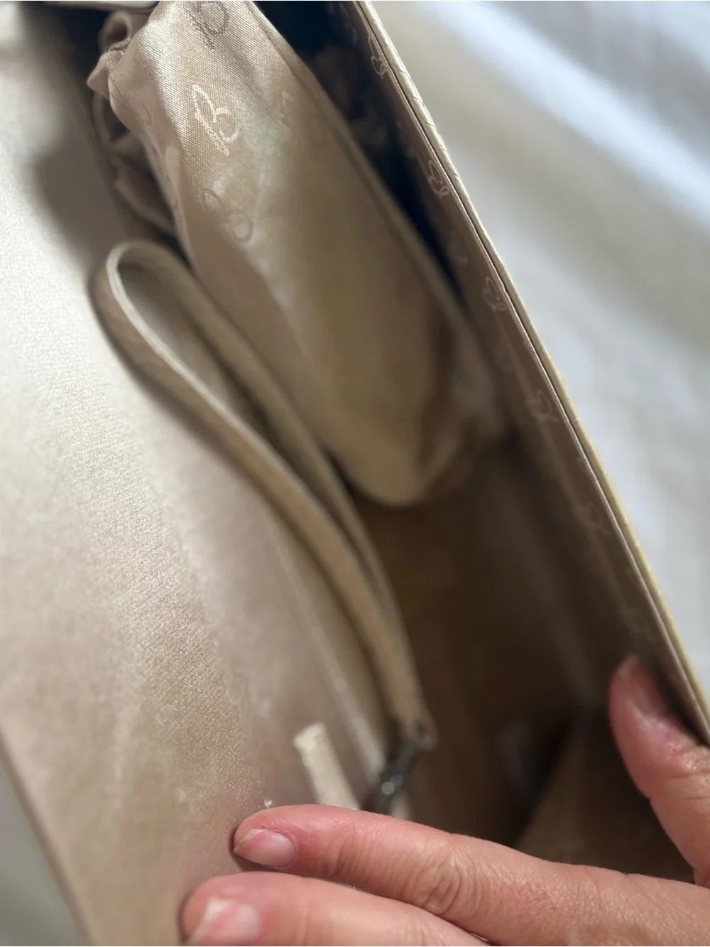 Cream Textured Bow Accent Clutch